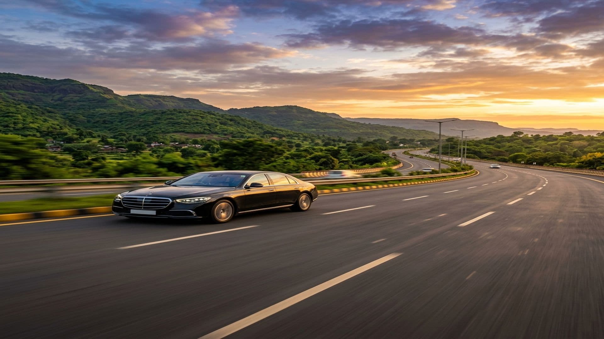 Premium sedan on Mumbai Pune Expressway at sunset — Zoverra car rental service